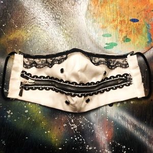 White and black “Zip the lips” face mask